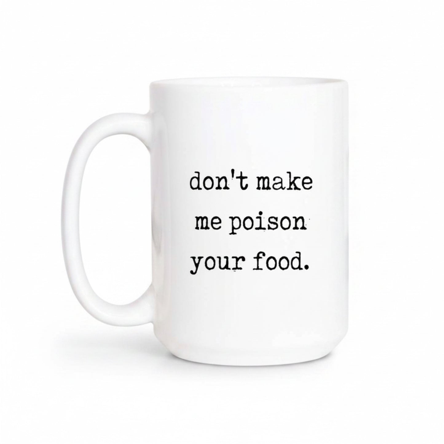 White mug with text 'don't make me poison your food' on a white background