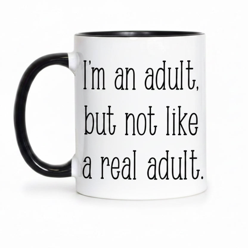 Mug with humorous text 'I'm an adult, but not like a real adult' on a white background.