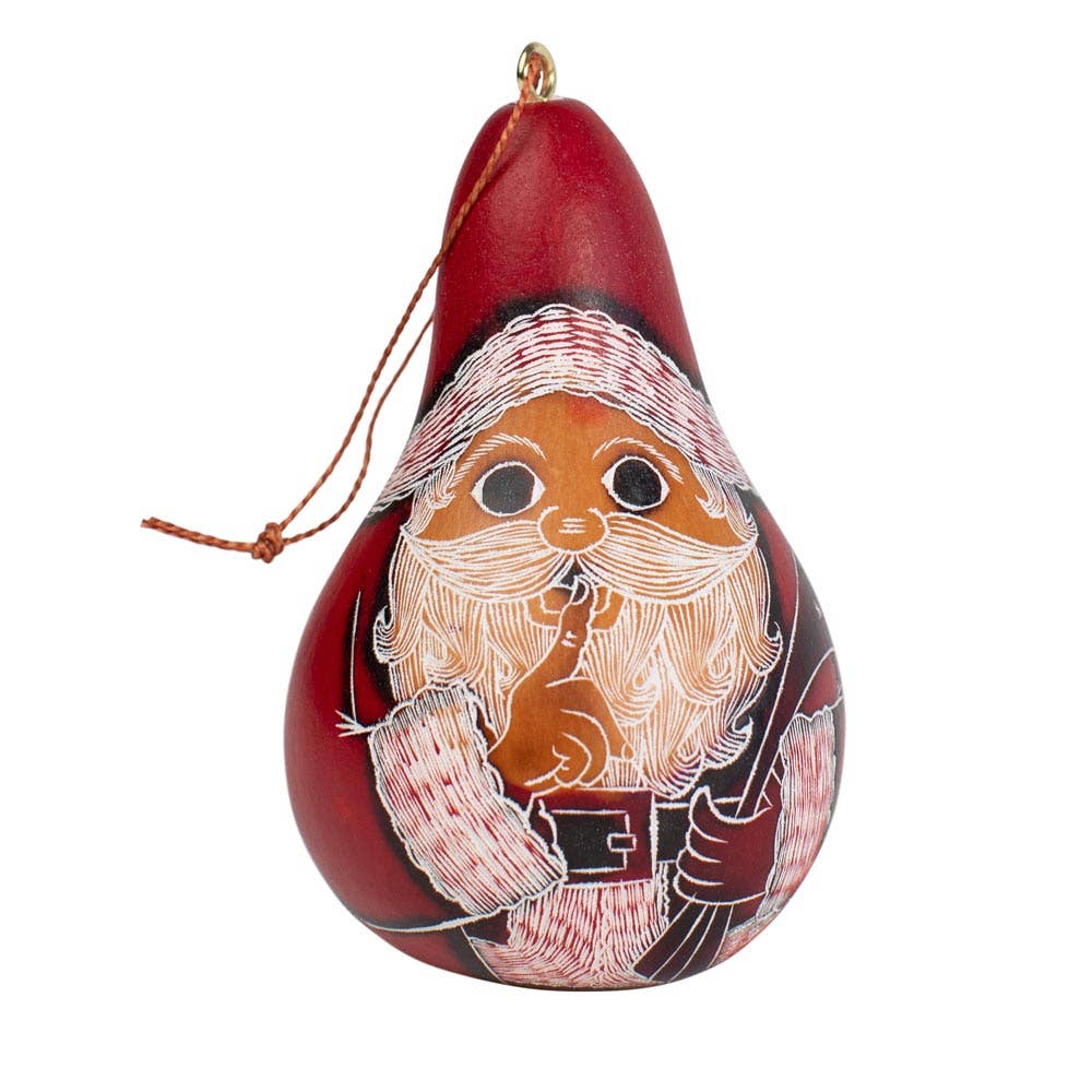 Decorative gourd ornament with a painted Santa face on a white background