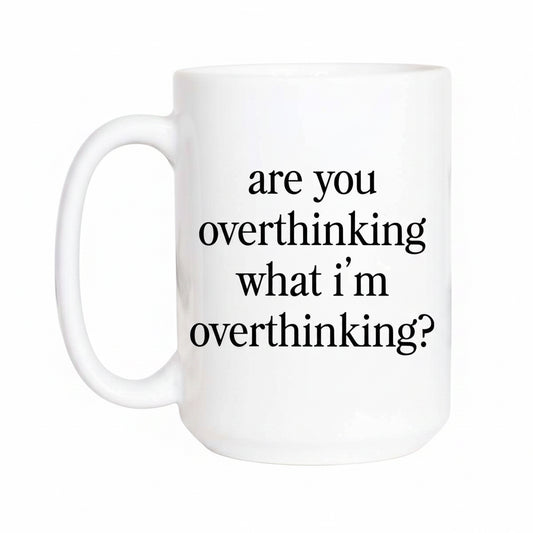 White mug with text 'are you overthinking what i'm overthinking?' on a white background