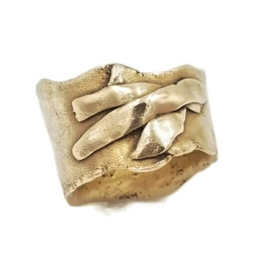 A textured bronze ring with a wide, organic shape and layered details, shown on a plain white background.