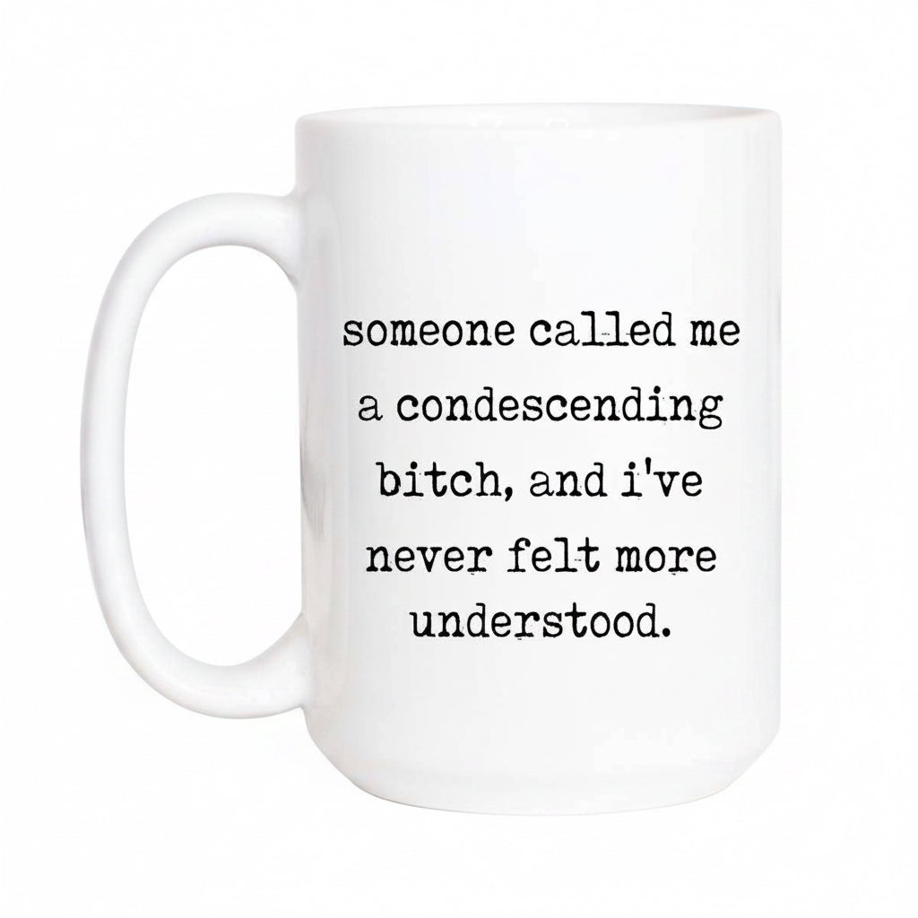 White mug with black text on a white background