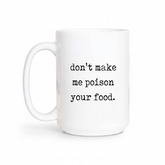 White mug with text 'don't make me poison your food' on a white background