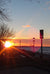 Sunset over the Boardwalk in Grand Haven, MI. Photo credit Cristine Grimm.