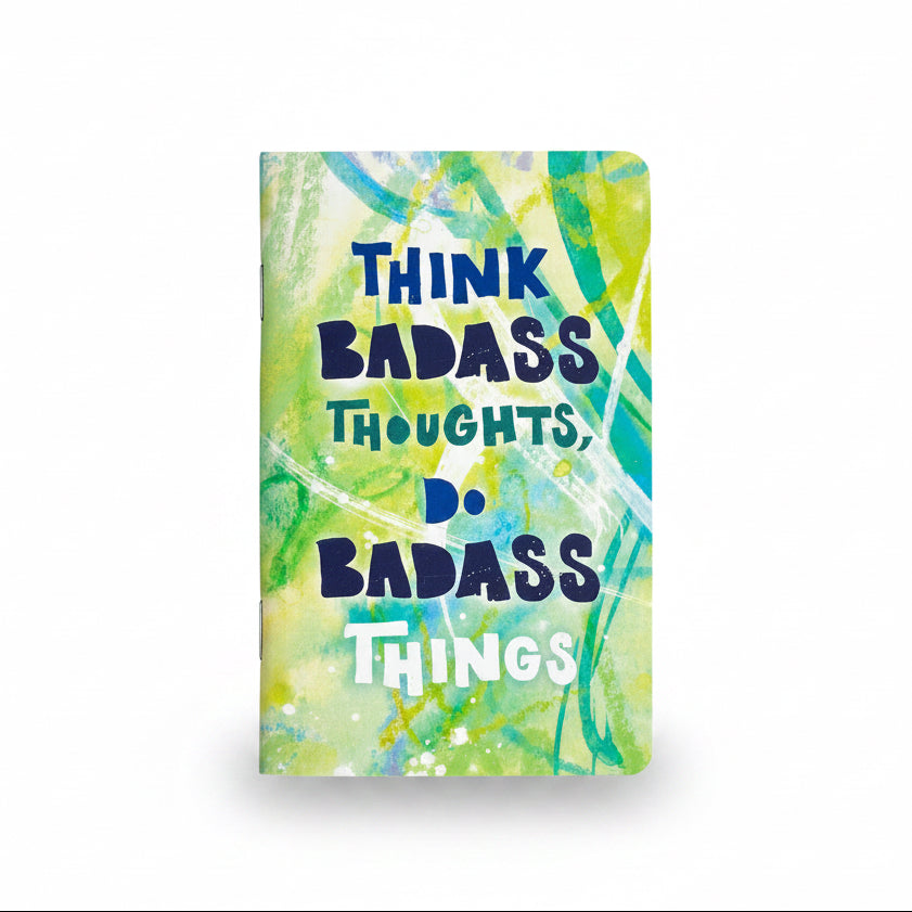 Notebook with 'Think BADASS thoughts, DO BADASS things' text on a white background