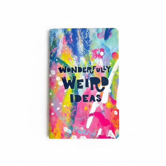 Colorful notebook with 'Wonderfully Weird Ideas' text on a white background
