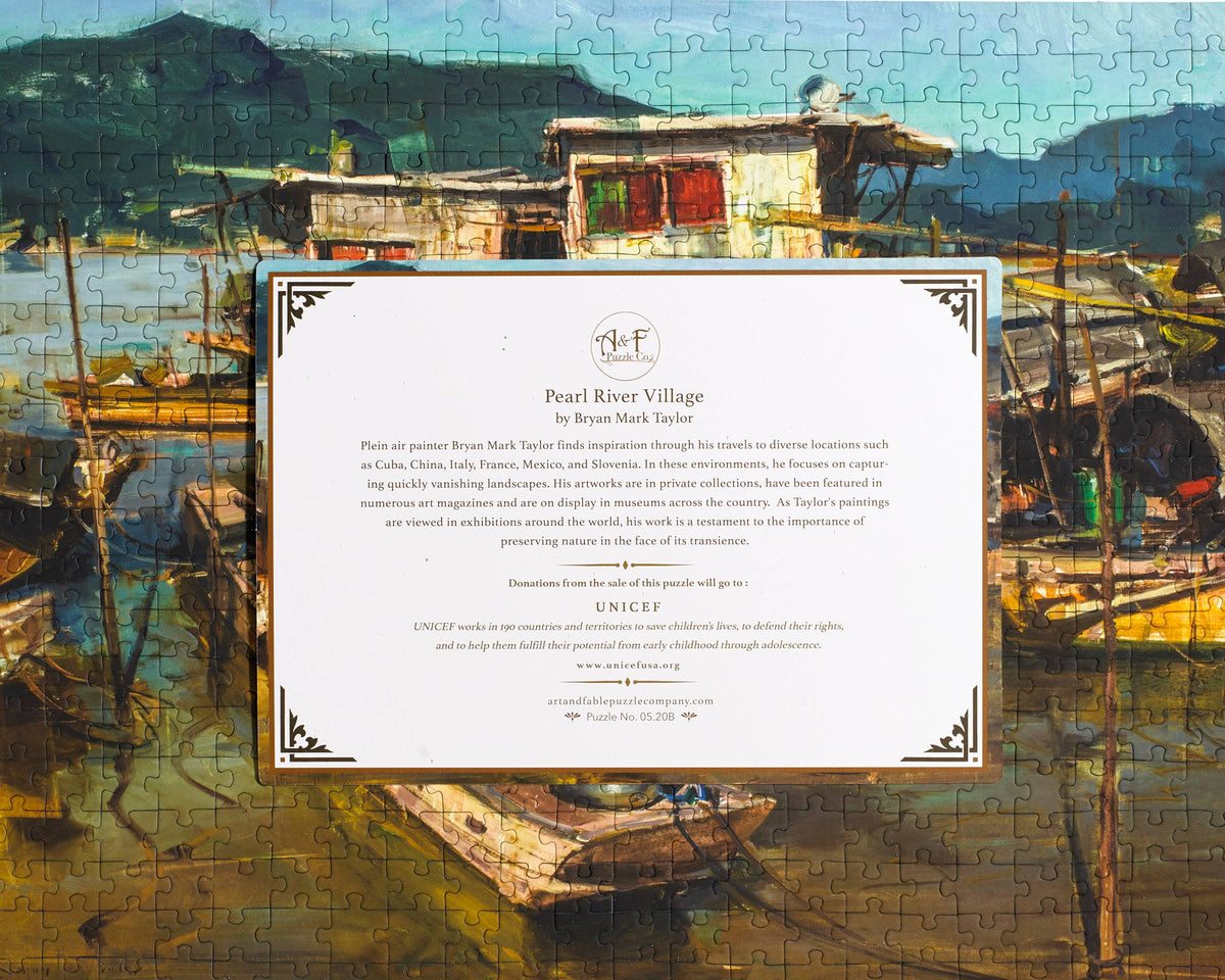 Jigsaw puzzle with a scenic layout of boats and buildings on a dock, featuring UNICEF branding.