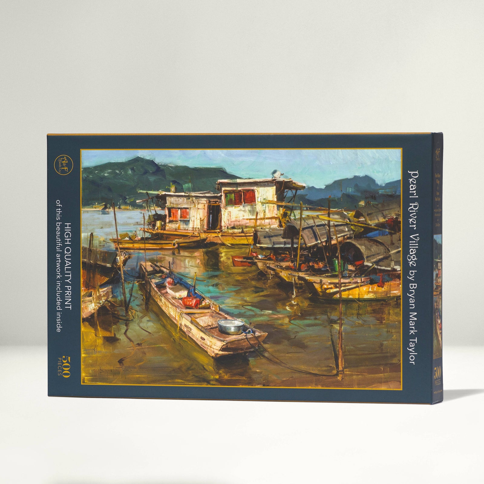 Art print puzzle packaging with a scenic depiction of boats and houses on a lake.